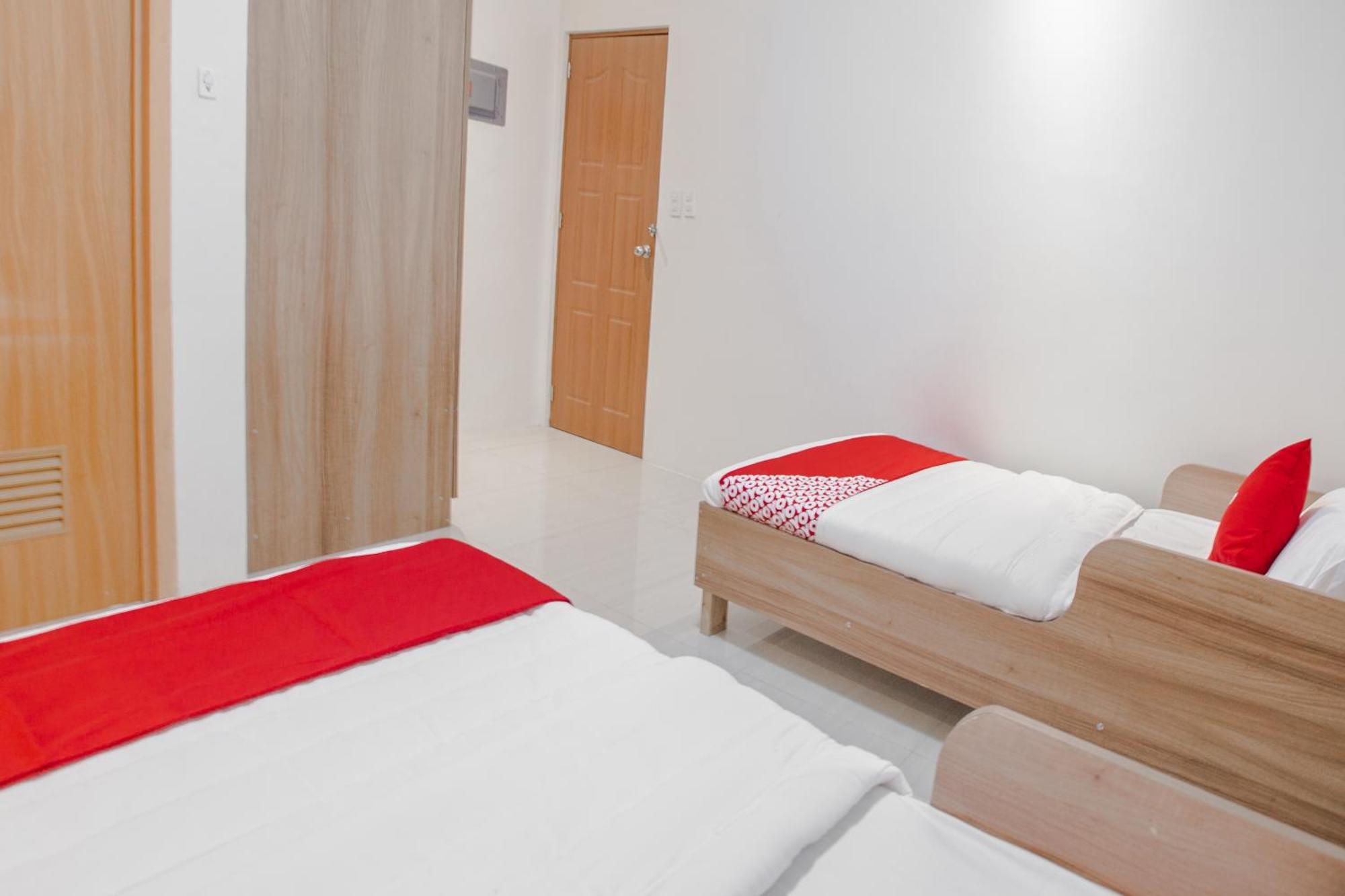 Hotel Oyo 605 The Quarters à Manille Extérieur photo